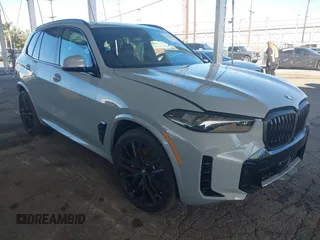2025 BMW X5 sDrive40i with VIN 5UX13EU06S9Y55088, listed as a IAAI auction lot 41621580 with 1 mi miles. Bid and sale history available at carsss.com. Image 1.