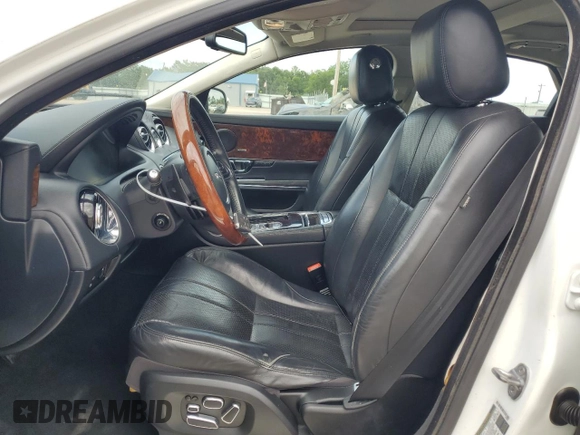 2015 Jaguar XJ with VIN SAJWA1CZ9F8V82974, listed as a Copart auction lot 59364344 with 64,012 mi miles and Salvage Title. Bid and sale history available at carsss.com. Image 7.
