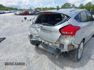 2018 Ford Focus Titanium with VIN 1FADP3N29JL232336, listed as a IAAI auction lot 42485243 with 82,113 mi miles and . Bid and sale history available at DreamBid. Image 6.