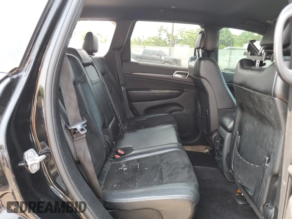 2017 Jeep Grand Cherokee Altitude with VIN 1C4RJFAG5HC892291, listed as a Copart auction lot 58579975 with 71,018 mi miles and Salvage title. Bid and sale history available at DreamBid. Image 11.