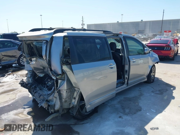 2015 Toyota Sienna SE with VIN 5TDXK3DC7FS684341, listed as a IAAI auction lot 41959077 with 154,377 mi miles and . Bid and sale history available at DreamBid. Image 4.