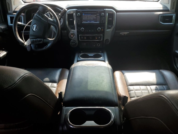 2017 Nissan Titan Pro-4X z VIN 1N6BA1F43HN562363, wystawiony jako Copart lot #58604115 z przebiegiem 102 412 mil mil oraz Czysty tytuł • Clean title. Historia ofert i sprzedaży dostępna na DreamBid. Obrazek 8.