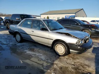 1990 Toyota Camry z VIN 4T1VV21EXLU008760, wystawiony jako Copart lot #88344665 z przebiegiem 154 971 mil mil oraz Nie do naprawy • Non repairable. Historia ofert i sprzedaży dostępna na DreamBid. Obrazek 4.