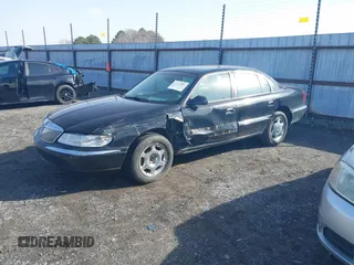 2001 Lincoln Continental with VIN 1LNHM97V41Y716010, listed as a IAAI auction lot 41470767 with 163,092 mi miles and . Bid and sale history available at DreamBid. Image 2.
