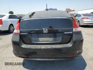 2010 Honda Insight LX with VIN JHMZE2H59AS041185, listed as a Copart auction lot 64517415 with 208,242 mi miles and Salvage title. Bid and sale history available at DreamBid. Image 6.