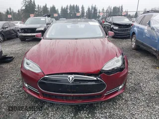 2012 Tesla Model S Performance with VIN 5YJSA1DP3CFS00394, listed as a IAAI auction lot 41309464 with 91,561 mi miles and . Bid and sale history available at DreamBid. Image 12.