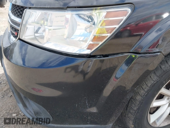 2013 Dodge Journey SXT with VIN 3C4PDDBG7DT553130, listed as a IAAI auction lot 40570369 with Not Provided miles and . Bid and sale history available at DreamBid. Image 15.