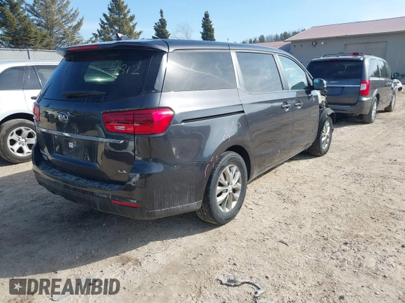 2020 Kia Sedona LX with VIN KNDMB5C13L6617567, listed as a IAAI auction lot 41774812 with 68,500 mi miles. Bid and sale history available at carsss.com. Image 4.