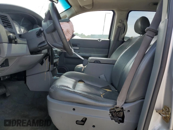 2004 Dodge Durango Limited with VIN 1D4HD58D94F154997, listed as a Copart auction lot 58973804 with 208,595 mi miles and Salvage title. Bid and sale history available at DreamBid. Image 7.