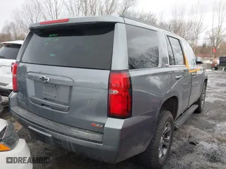 2018 Chevrolet Tahoe LT with VIN 1GNSKBKC4JR183090, listed as a IAAI auction lot 41427881 with 114,031 mi miles. Bid and sale history available at carsss.com. Image 4.
