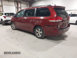 2013 Toyota Sienna LE AAS with VIN 5TDKK3DC6DS298372, listed as a IAAI auction lot 42062376 with 313,697 mi miles. Bid and sale history available at carsss.com. Image 3.