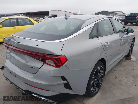 2024 Kia K5 GT-Line z VIN 5XXG64J29RG237148, wystawiony jako IAAI lot #41396574 z przebiegiem 22 926 mil mil oraz . Historia ofert i sprzedaży dostępna na DreamBid. Obrazek 4.