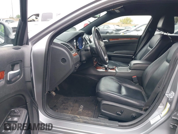 2014 Chrysler 300 with VIN 2C3CCAAG7EH249196, listed as a IAAI auction lot 42180023 with 48,241 mi miles and . Bid and sale history available at DreamBid. Image 5.