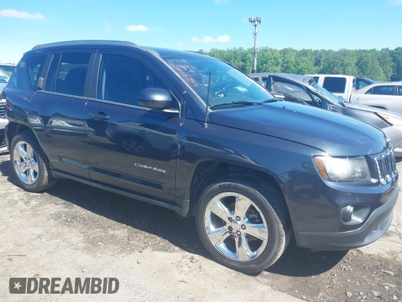 2015 Jeep Compass Latitude with VIN 1C4NJCEBXFD179373, listed as a IAAI auction lot 39380614 with 104,832 mi miles. Bid and sale history available at carsss.com. Image 14.