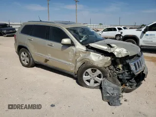 2012 Jeep Grand Cherokee Laredo with VIN 1C4RJEAG7CC125383, listed as a Copart auction lot 51180845 with 0 mi miles and Salvage Title. Bid and sale history available at carsss.com. Image 4.