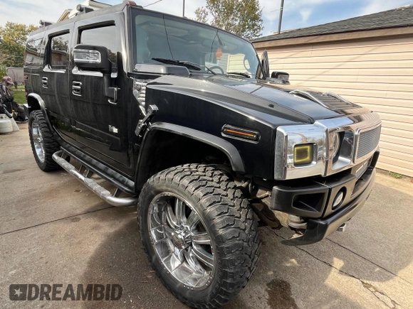 2004 Hummer H2 with VIN 5GRGN23U14H115951, listed as a Copart auction lot 79581694 with 88,845 mi miles and Salvage Title. Bid and sale history available at carsss.com. Image 1.