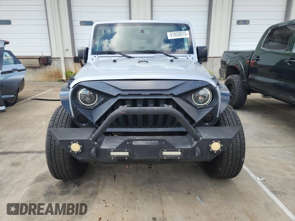 2016 Jeep Wrangler Unlimited Sahara with VIN 1C4BJWEG6GL168944, listed as a Copart auction lot 61650615 with 66,016 mi miles and Salvage title. Bid and sale history available at DreamBid. Image 5.