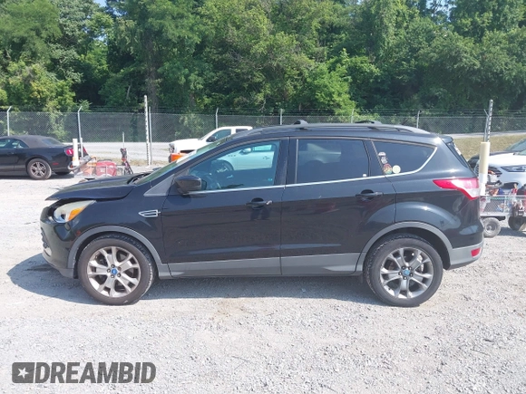 2013 Ford Escape SE z VIN 1FMCU9GX5DUA19887, wystawiony jako IAAI lot #42580986 z przebiegiem 169 407 mil mil oraz . Historia ofert i sprzedaży dostępna na DreamBid. Obrazek 14.