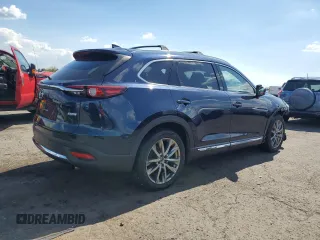 2017 Mazda CX-9 Grand Touring z VIN JM3TCBDY8H0131941, wystawiony jako Copart lot #56199685 z przebiegiem 166 080 mil mil oraz Szkoda całkowita • Salvage title. Historia ofert i sprzedaży dostępna na DreamBid. Obrazek 3.