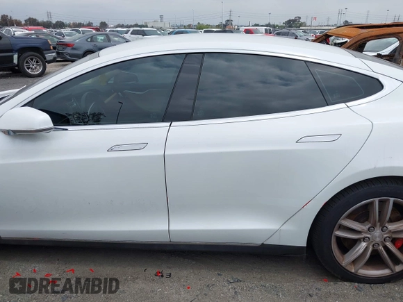 2016 Tesla Model S 90D with VIN 5YJSA1E40GF123543, listed as a IAAI auction lot 42111603 with 126,445 mi miles and . Bid and sale history available at DreamBid. Image 13.