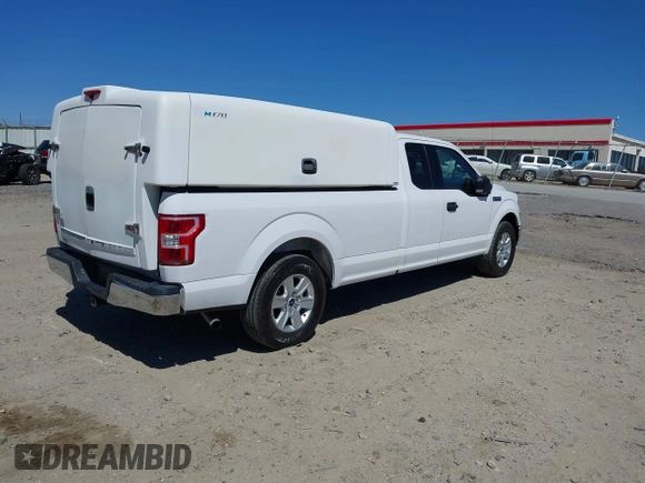 2018 Ford F-150 XL with VIN 1FTFX1C57JKF08037, listed as a IAAI auction lot 41863806 with 195,725 mi miles and . Bid and sale history available at DreamBid. Image 4.