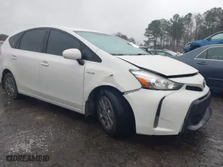 2017 Toyota Prius v Two with VIN JTDZN3EU0HJ059027, listed as a IAAI auction lot 41558868 with 215,604 mi miles. Bid and sale history available at carsss.com. Image 1.