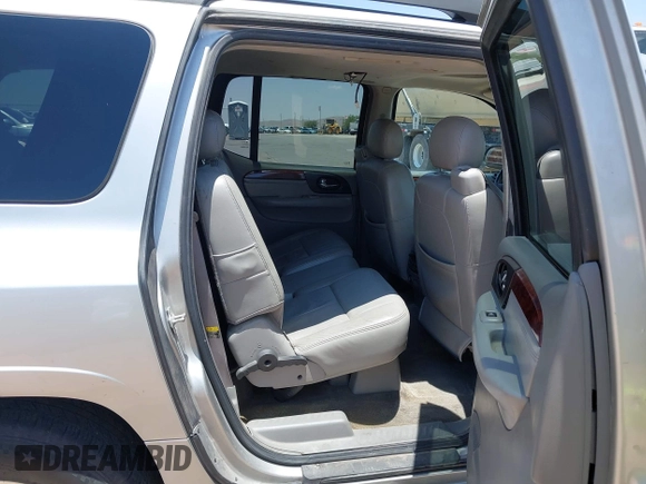 2005 GMC Envoy Denali z VIN 1GKES66M256205213, wystawiony jako IAAI lot #42356057 z przebiegiem 200 245 mil mil oraz . Historia ofert i sprzedaży dostępna na DreamBid. Obrazek 8.