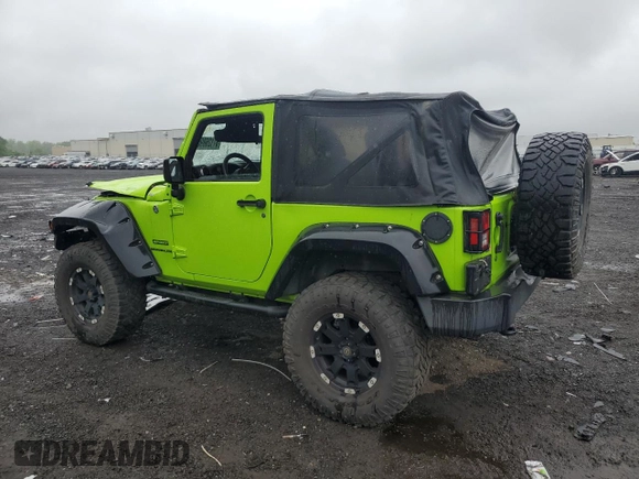 2012 Jeep Wrangler Sport with VIN 1C4AJWAG2CL233722, listed as a Copart auction lot 61125095 with 49,864 mi miles and Salvage title. Bid and sale history available at DreamBid. Image 2.