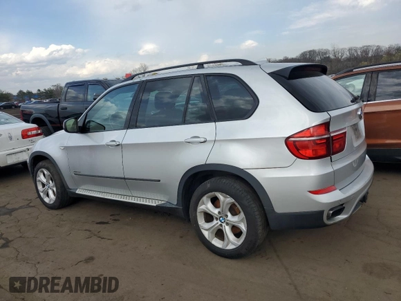 2013 BMW X5 xDrive50i with VIN 5UXZV8C52DL899056, listed as a Copart auction lot 53461625 with 186,598 mi miles and Clean title. Bid and sale history available at DreamBid. Image 2.