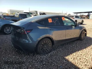 2022 Tesla Model Y Long Range z VIN 7SAYGDEE3NF543705, wystawiony jako Copart lot #50244955 z przebiegiem 59 063 mil mil oraz Szkody całkowita. Historia ofert i sprzedaży dostępna na DreamBid. Obrazek 3.