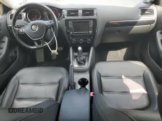 2017 Volkswagen Jetta SEL z VIN 3VWL17AJ9HM407735, wystawiony jako Copart lot #60257715 z przebiegiem 124 393 mil mil oraz Czysty tytuł • Clean title. Historia ofert i sprzedaży dostępna na DreamBid. Obrazek 8.