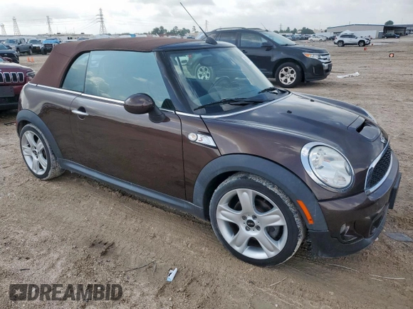 2011 MINI Convertible S with VIN WMWZP3C58BTX83725, listed as a Copart auction lot 60921875 with 45,400 mi miles and Salvage title. Bid and sale history available at DreamBid. Image 4.