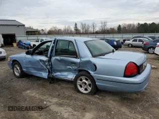 2001 Ford Crown Victoria Police Police Interceptor with VIN 2FAFP71W61X161009, listed as a Copart auction lot 81355274 with 85,072 mi miles and Salvage Title. Bid and sale history available at carsss.com. Image 2.