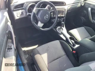 2014 Scion tC z VIN JTKJF5C74E3079471, wystawiony jako Copart lot #56996455 z przebiegiem 86 874 mil mil oraz Nie do naprawy. Historia ofert i sprzedaży dostępna na DreamBid. Obrazek 8.