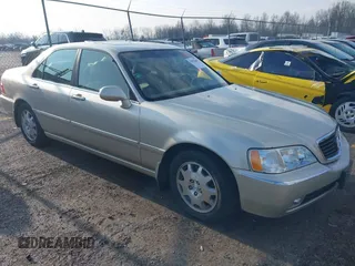 2004 Acura RL w/Navigation System with VIN JH4KA96664C001291, listed as a IAAI auction lot 41678449 with 83,954 mi miles. Bid and sale history available at carsss.com. Image 1.