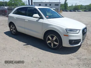 2015 Audi Q3 Premium Plus with VIN WA1EFCFS7FR012210, listed as a IAAI auction lot 42771683 with 229,799 mi miles and . Bid and sale history available at DreamBid. Image 1.