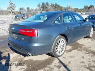 2014 Audi A6 Premium Plus z VIN WAUFGAFC2EN031240, wystawiony jako IAAI lot #41475791 z przebiegiem 68 156 mil mil oraz . Historia ofert i sprzedaży dostępna na DreamBid. Obrazek 4.