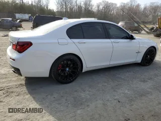 2015 BMW 7 Series 750i xDrive с VIN WBAYB6C50FD225492, выставлен на аукционе Copart как лот 50018225 с пробегом 76 059 миль миль и Списание • Salvage title. История ставок и продаж доступна на DreamBid. Изображение 3.