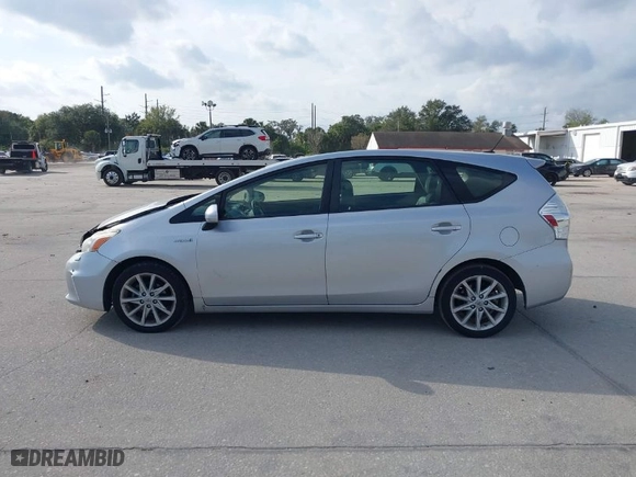 2014 Toyota Prius v Two with VIN JTDZN3EUXE3319787, listed as a IAAI auction lot 41246063 with 96,149 mi miles. Bid and sale history available at carsss.com. Image 14.