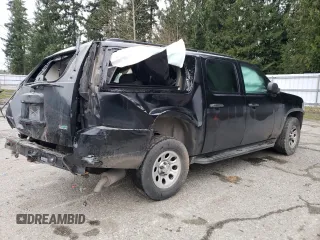 2010 Chevrolet Suburban LS z VIN 1GNUKHE3XAR192464, wystawiony jako Copart lot #87311324 z przebiegiem Nie podano mil oraz Szkoda całkowita • Salvage title. Historia ofert i sprzedaży dostępna na DreamBid. Obrazek 3.