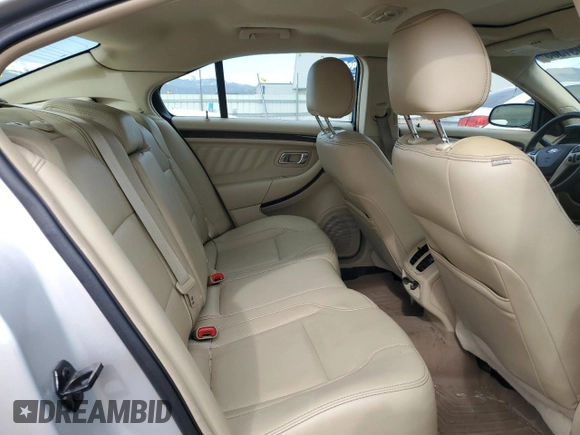 2013 Ford Taurus Limited with VIN 1FAHP2F82DG235526, listed as a Copart auction lot 52051365 with 106,459 mi miles and Salvage Title. Bid and sale history available at DreamBid. Image 10.