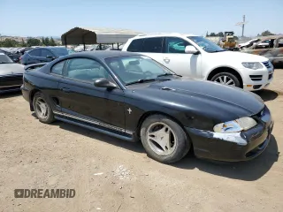 1997 Ford Mustang with VIN 1FALP4048VF172130, listed as a Copart auction lot 59790275 with 125,336 mi miles and Salvage title. Bid and sale history available at DreamBid. Image 4.