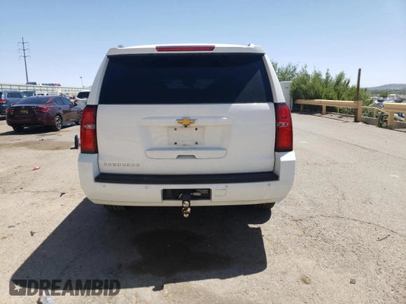 2015 Chevrolet Suburban LT z VIN 1GNSCJKC4FR549967, wystawiony jako Copart lot #57952955 z przebiegiem 311 163 mil mil oraz Szkoda całkowita • Salvage title. Historia ofert i sprzedaży dostępna na DreamBid. Obrazek 6.