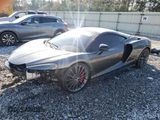 2021 McLaren GT with VIN SBM22GCA8MW001374, listed as a Copart auction lot 82147064 with 32,562 mi miles and Non Repairable. Bid and sale history available at carsss.com. Image 1.