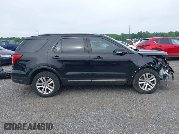2018 Ford Explorer XLT z VIN 1FM5K8D81JGB94119, wystawiony jako IAAI lot #42346378 z przebiegiem 151 511 mil mil oraz . Historia ofert i sprzedaży dostępna na DreamBid. Obrazek 14.