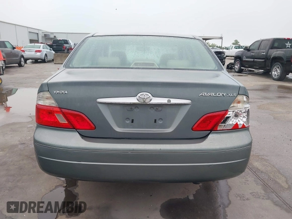 2004 Toyota Avalon XL with VIN 4T1BF28B94U387764, listed as a IAAI auction lot 42162419 with 306,611 mi miles and . Bid and sale history available at carsss.com. Image 16.