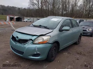 2009 Toyota Yaris with VIN JTDBT903591344333, listed as a IAAI auction lot 41296702 with 166,979 mi miles. Bid and sale history available at carsss.com. Image 2.