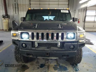 2003 Hummer H2 with VIN 5GRGN23U73H116472, listed as a Copart auction lot 86919214 with 172,543 mi miles and Salvage Title. Bid and sale history available at carsss.com. Image 5.