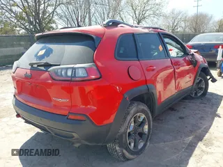2019 Jeep Cherokee Trailhawk Elite with VIN 1C4PJMBX8KD305108, listed as a IAAI auction lot 41763970 with 70,705 mi miles. Bid and sale history available at carsss.com. Image 4.