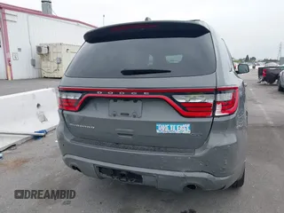 2023 Dodge Durango GT Plus with VIN 1C4RDHDG8PC551884, listed as a IAAI auction lot 42033893 with 43,370 mi miles and . Bid and sale history available at DreamBid. Image 17.